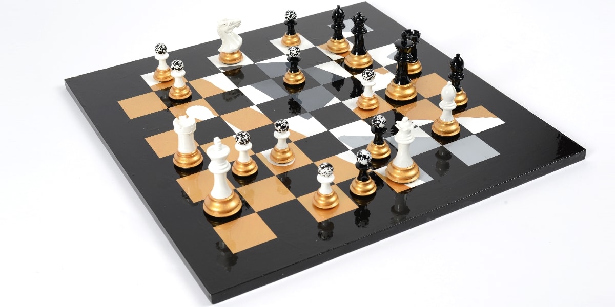 Darren-John-hand-painted-chess-set-pieces-in-play