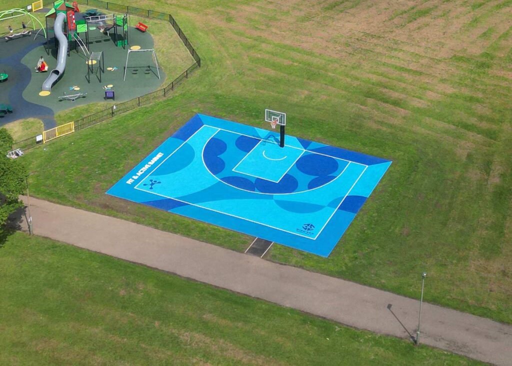 Darren-John---Absolutely-Studio---Barnet-Playing-Fields-Rise-3x3-Basketball-court-mural-regeneration-artwork---drone-02-mobile-banner